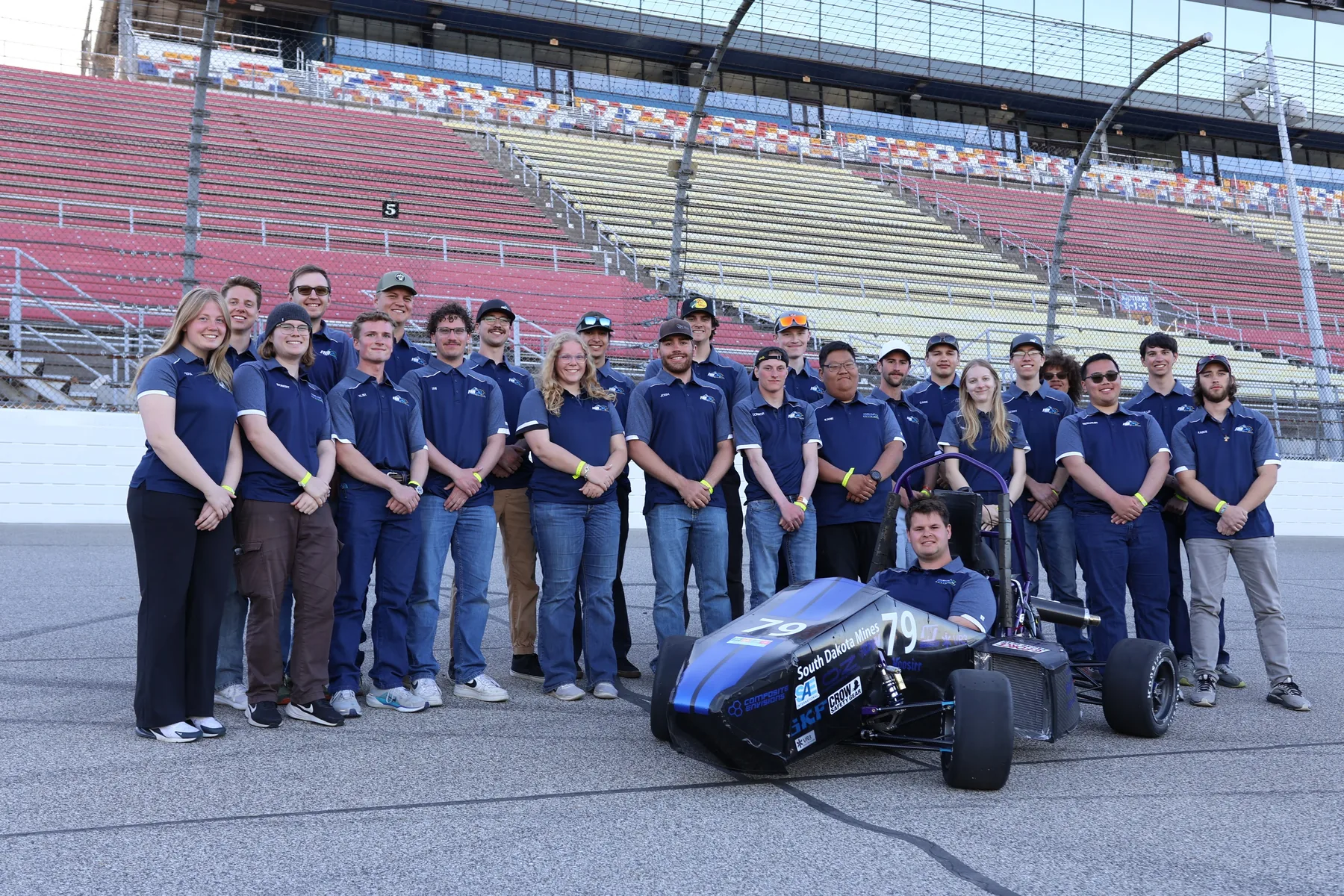 Clint Winkler with the Hardrocker Racing Formula SAE team and 2026 competition car